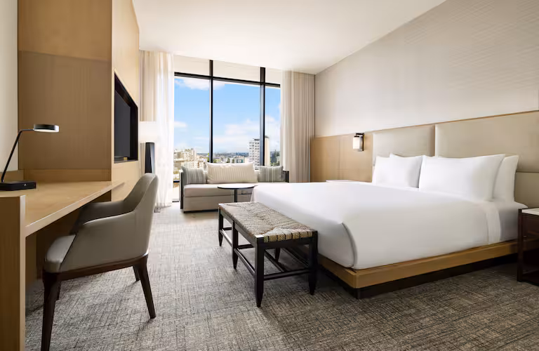 Luxury guest room lounge Hotel Santiago Curio Collection Hilton