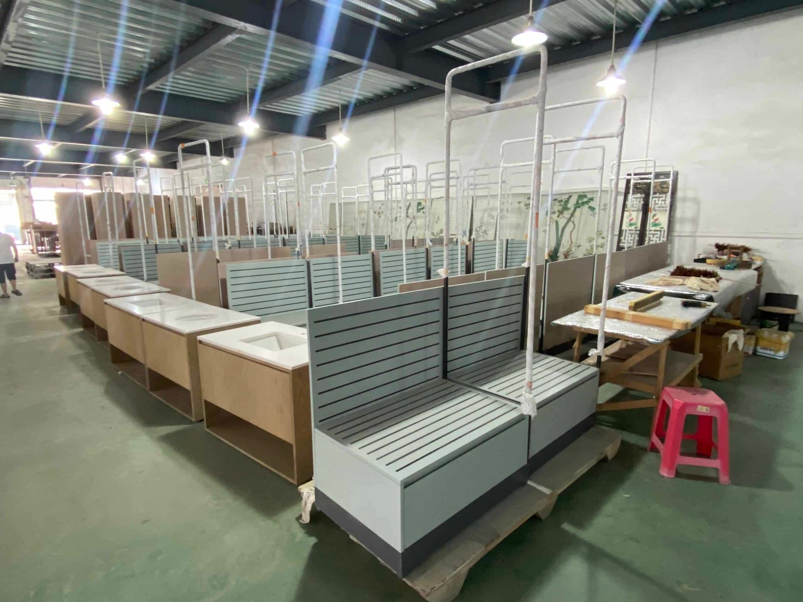 Guest using a luggage rack in hotel to unpack suitcase