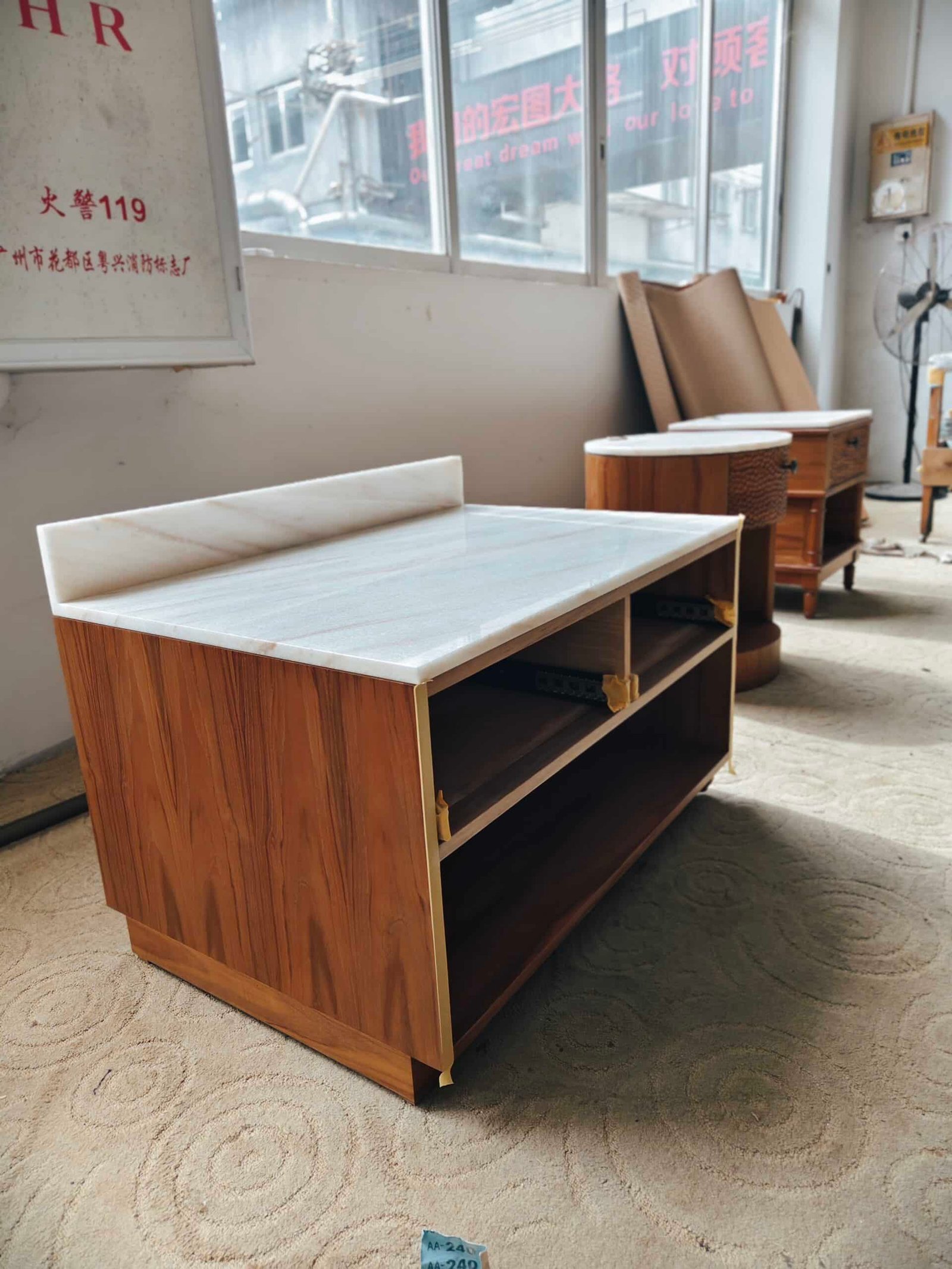 Guest using a luggage rack in hotel to unpack suitcase
